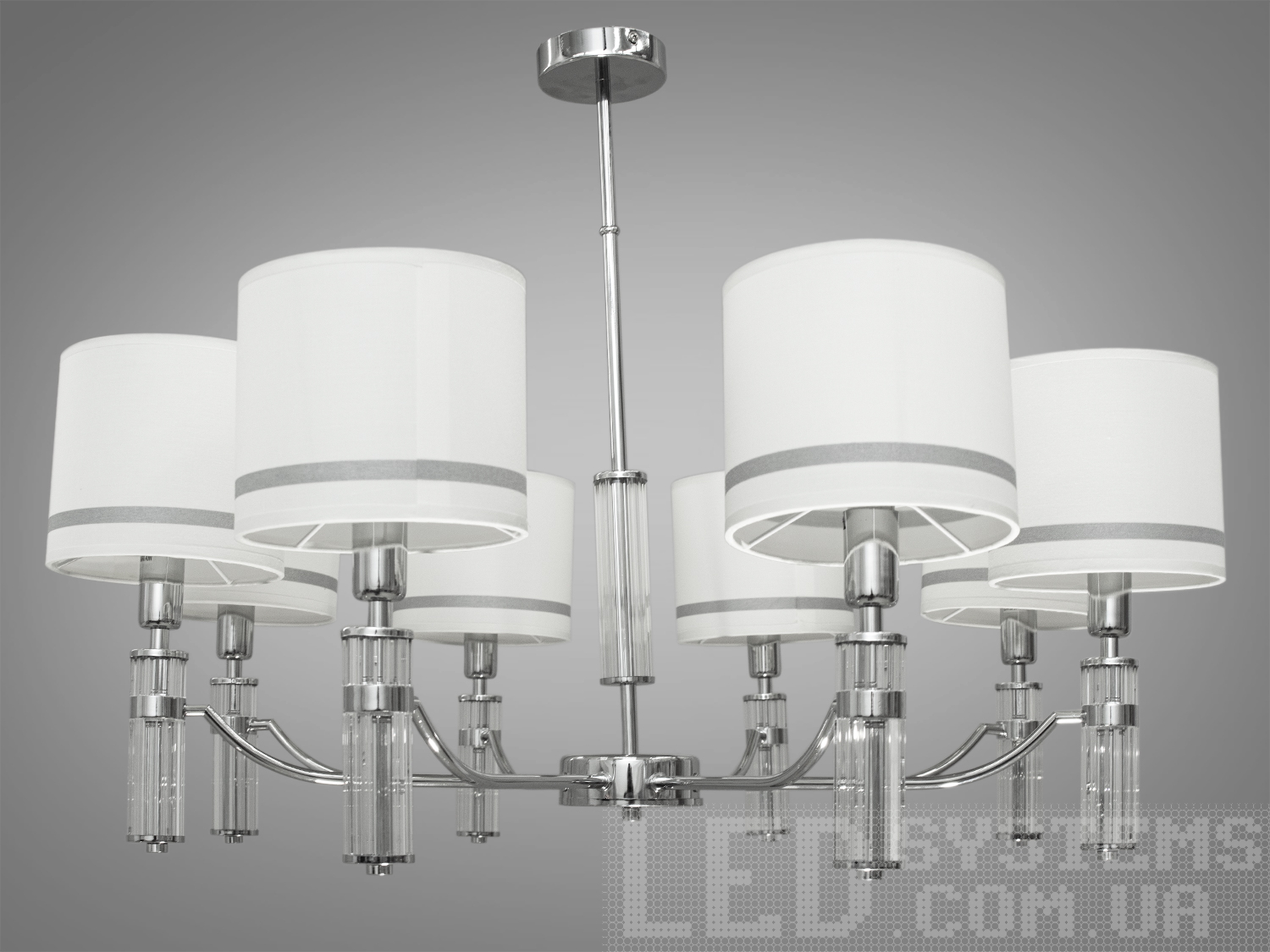 Велика люстра в хол у класичному стилі з абажурами з витонченою металевою основою та стильними кришталевими лаконічними елементами. Ви можете вибирати виконання металевих частин у золотому або хромованому варіанті. Застосовується для вітальні, залу, холу, спальні. У цій серії люстр і бра ідеально переплелися такі поняття, як солідність, строгість і простота.
Люстри та бра цієї моделі під звичайні лампи розжарювання або &laquo;LED-економки&raquo; на патрон Е14 внесуть класичні нотки до Вашого інтер'єру та дозволять підібрати потрібну вам температуру світіння.Універсальним кріпленням на планку легко кріпляться на будь-який тип стелі (підвісний, натяжний, звичайний). Увімкнення/вимкнення відбувається з настінного вимикача.