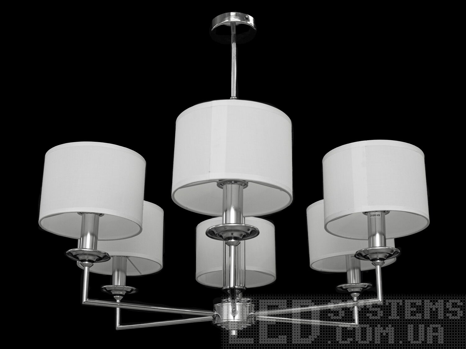 Сучасна класична люстра з абажурами в спальню, з витонченою металевою основою і стильними кришталевими елементами. Застосовується для вітальні, залу, холу, спальні. У цій серії люстр і бра ідеально переплелися такі поняття, як солідність, строгість і простота.
Люстри та бра цієї моделі під звичайні лампи розжарювання або &laquo;LED-економки&raquo; на патрон Е14 внесуть класичні нотки до Вашого інтер'єру та дозволять підібрати потрібну вам температуру світіння.Універсальним кріпленням на планку легко кріпляться на будь-який тип стелі (підвісний, натяжний, звичайний). Увімкнення/вимкнення відбувається з настінного вимикача.