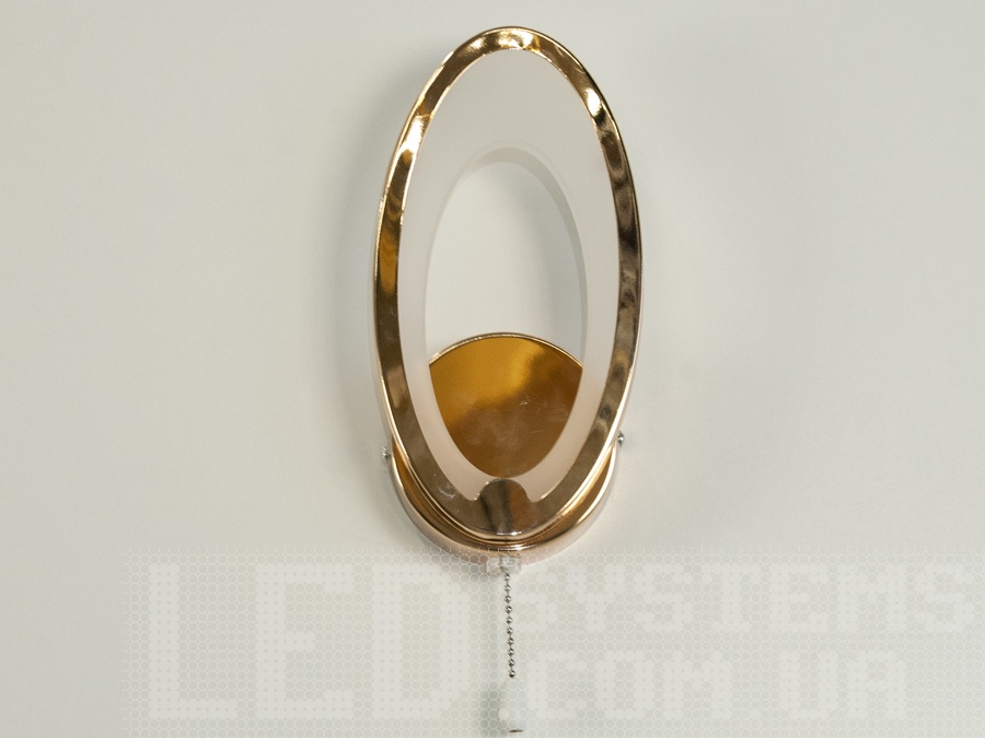 Витончене світлодіодне бра овальної форми є втіленням сучасного мистецтва в освітленні. Воно гармонійно поєднує витонченість форми з функціональністю. Акриловий розсіювач м'яко обрамляє світло, створюючи ефект, що зачаровує, а металева основа надає конструкції міцності та стильного мінімалізму.
Світильник пропонує три режими освітлення: холодне світло підкреслює чистоту ліній і додає сучасний акцент, тепле світло створює атмосферу затишку та розслабленості, а нейтральне світло ідеально підходить для повсякденного використання, заповнюючи простір м'яким, рівномірним сяйвом.
Це бра &mdash; не просто освітлювальний прилад, а елемент декору, який додає простору елегантності й особливої енергетики, наповнюючи його світлом і сучасністю.
Кріпиться до стіни будь-якого типу універсальним кріпленням на монтажну планку.