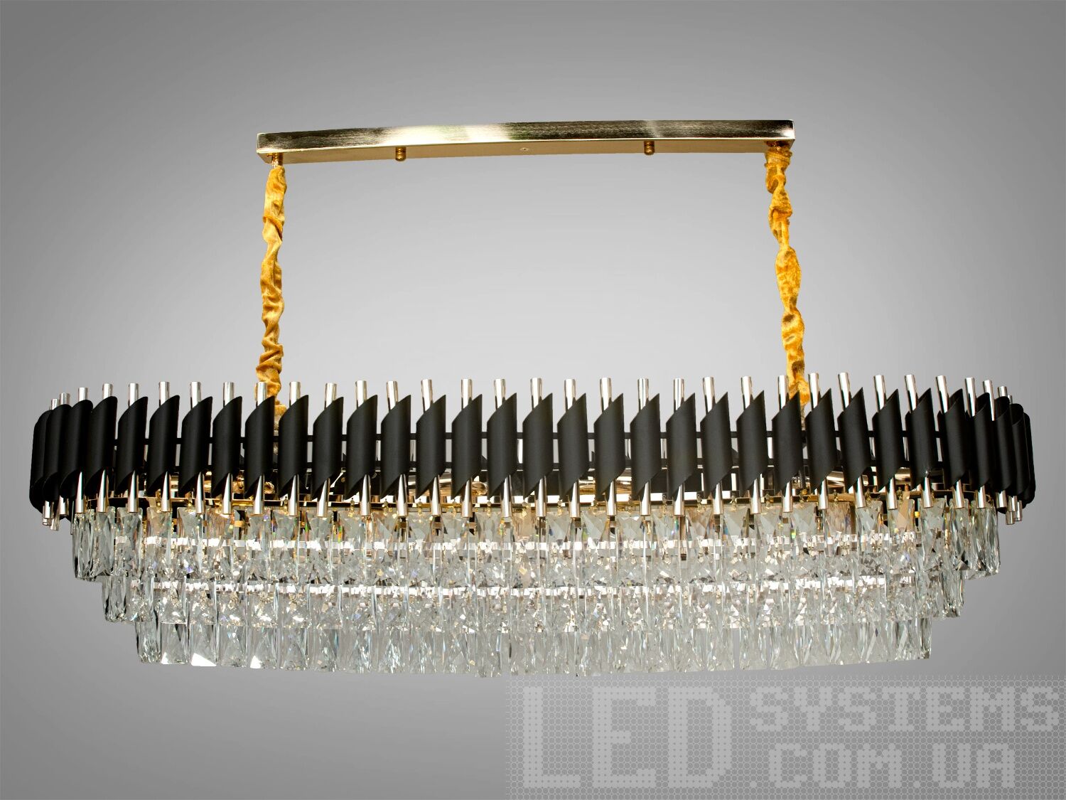 &nbsp;Овальная хрустальная люстра для столовой под классическую лампу или экономку которые идеально подойдут для небольших комнат, и даже для низких потолков, подходит для натяжных, навесных, обычных потолков. Изящная, окаймленная дугой из трубок&nbsp; с ярким многогранным хрусталем люстра для стильного современного интерьера. Пропорции овальных люстр идеально гармонируют с большими обеденными столами. Люстра специально расчитана так, что максимум яркого света попадёт на стол, а остальное пространство помещения наполнится мягким светом рассеяным хрустальными подвесками.&nbsp;
Внимание. Вес люстры 14.5кг.