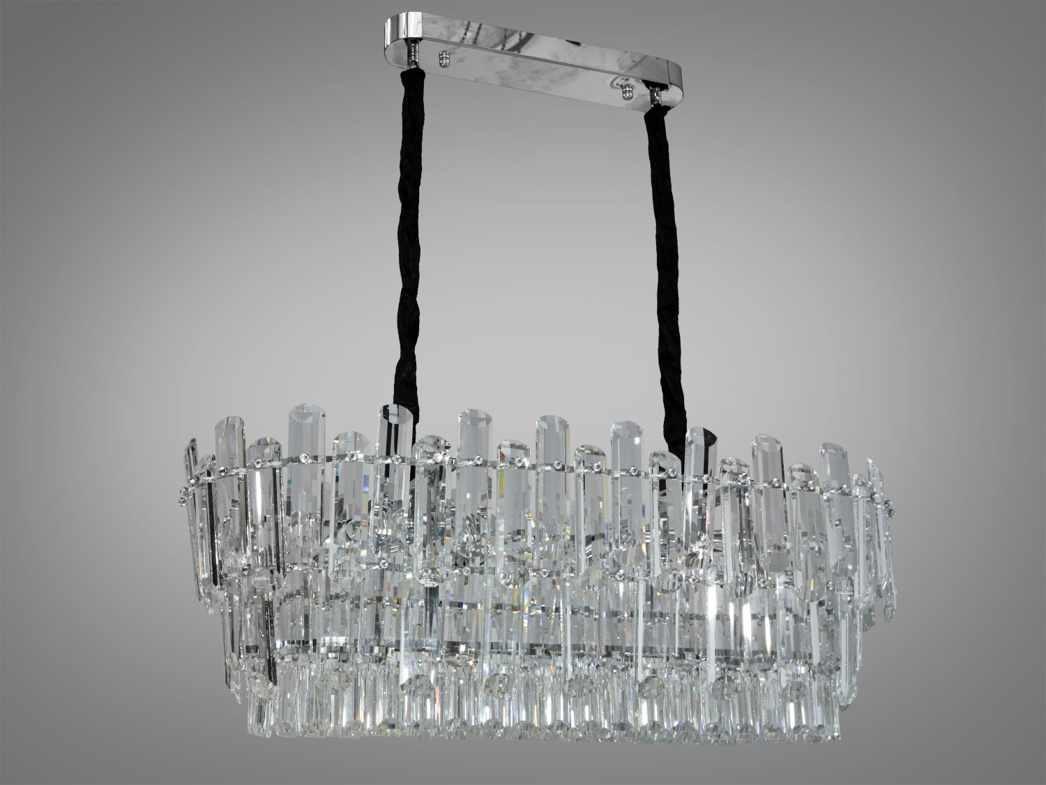 Эксклюзивная хрустальная люстра овальной формы для зала идеально подойдет к классическим, современным или даже минималистичным интерьерам, придавая им шарм и элегантность. Она может быть использована в разных просторах: от гостевых комнат и спален до больших залов и конференц-залов.
Пропорции овальных люстр совершенно гармонируют с большими обеденными столами. Люстра специально рассчитана так, что максимум яркого света попадет на стол, а остальное место наполнится мягким рассеянным светом хрустальными подвесками. На нее можно смотреть под любым углом.
Хрустали отшлифованы до такого совершенства, что каждый попадающий на них луч света разбивается на тысячи радужных искр.Текстильный шнур, поддерживающий конструкцию, придает ей дополнительный шарм и подчеркивает единение классики и современности в дизайне люстры.
Высота люстры регулируется благодаря чему подходит для низких потолков. Люстра-подвес под лампы накаливания, экономки или светодиодные лампы с цоколем Е14. Потолочный крепеж подходит для подвесных, натяжных и обычных потолков.
Внимание. Вес люстры 13.9 кг.
Лампы в комплекте не входят.