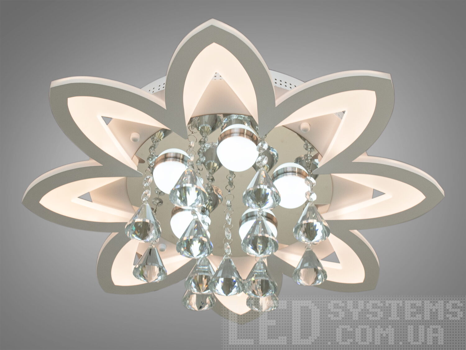 Стильна світлодіодна люстра з димером підходить для приміщень із площею приблизно 12 кв.м. Застосовується для спальні, зали, вітальні, кухні, також для дитячої кімнати, оскільки відсутні скляні елементи. Люстра світить яскраво, але не сліпить за рахунок матеріалу акрилу, до того ж цей матеріал дуже міцний його важко пошкодити.
Є різні режими освітлення: холодний 6400К, нейтральний 4500К, теплий 2700К, нічник. Включити режим 