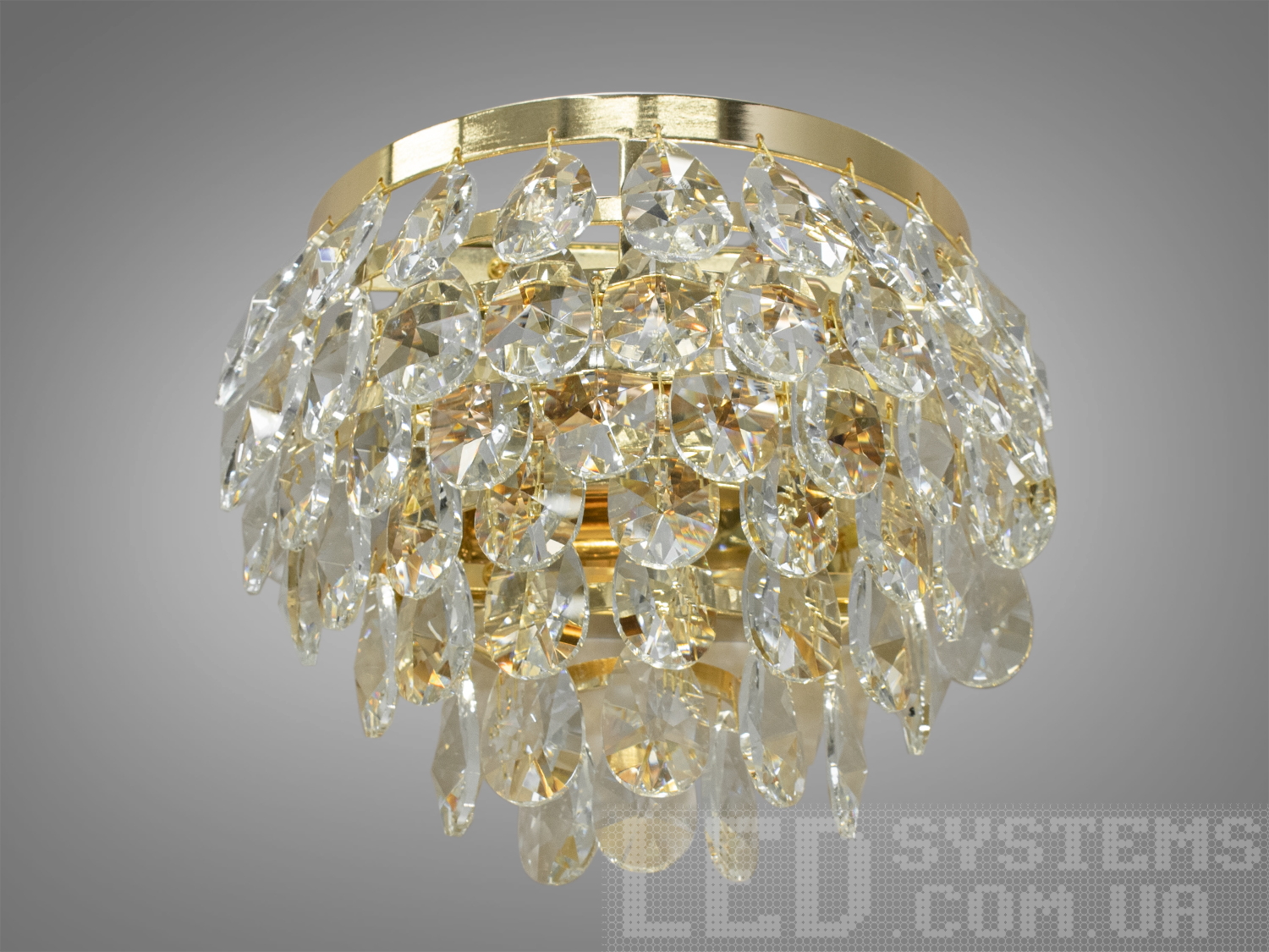 Класичне бра з кришталевими підвісками з металевим корпусом добре виглядатиме в інтер'єрі спальні, зали, їдальні, коридору. Блиск та переливи справжнього кришталю зачаровують. Нові настінні світильники виконані в класичному стилі та розраховані на 2 лампи з цоколем Е14. Універсальне кріплення на планку підходить для будь-якого типу стін.