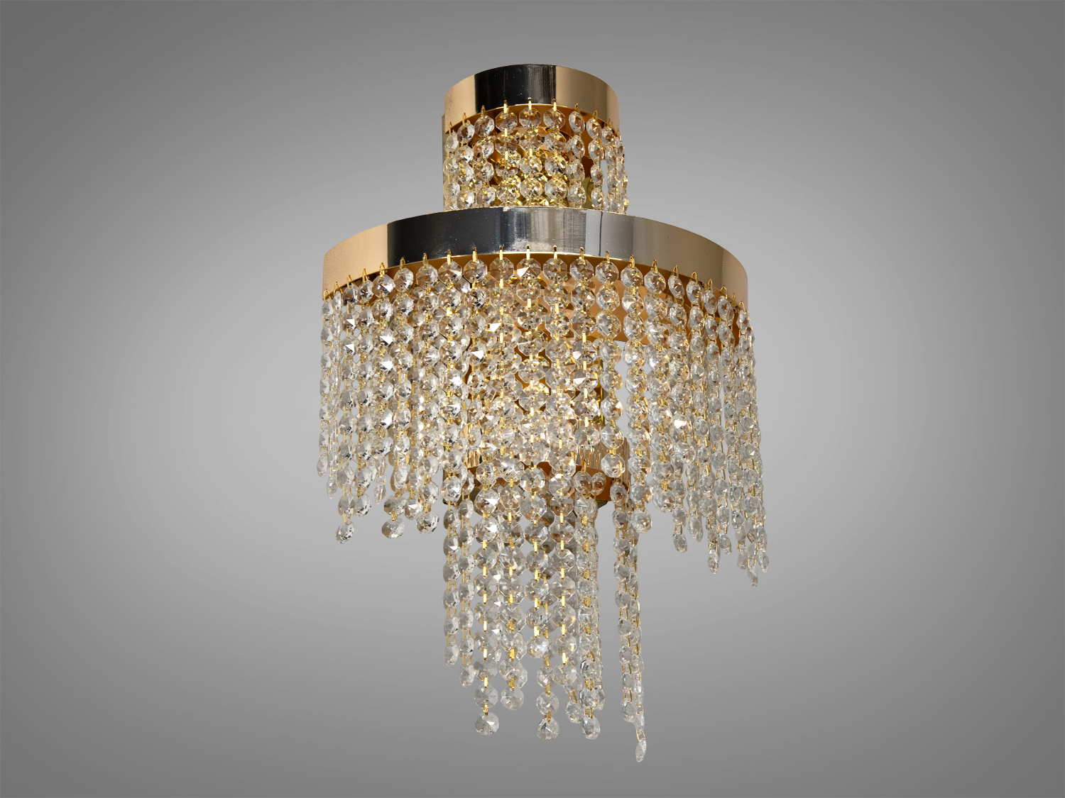 Настінний світильник 376-BGD в золотому виконанні з кришталевими підвісками, ідеальний для класичного інтер′єру, додає розкіш та вишуканість.