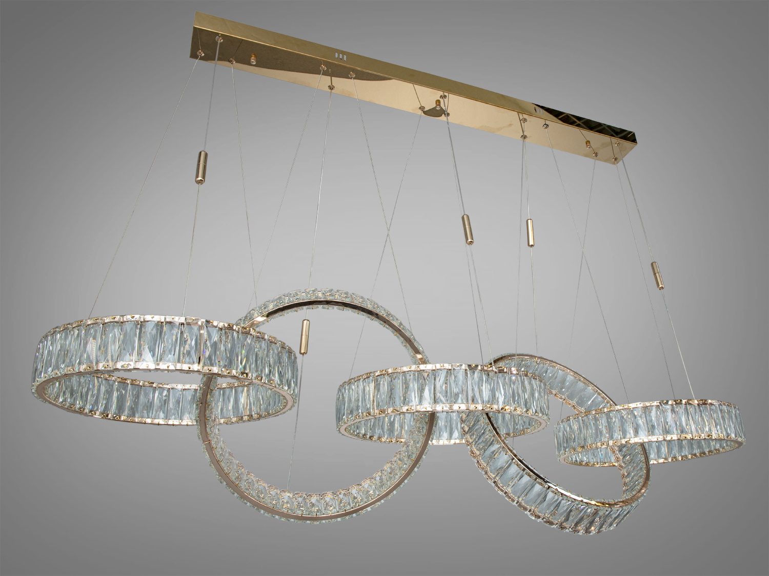 LED підвісна люстра Diasha 523-400x5G-LS золотого кольору з кришталевими кільцями для сучасних просторих інтер′єрів.