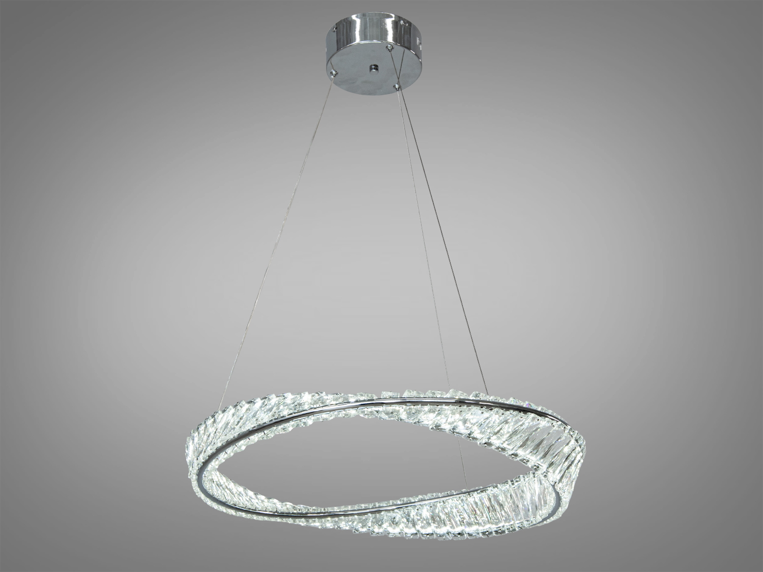 Підвісна кришталева LED люстра для зали - втілення витонченої елегантності, де металевий каркас у поєднанні з кришталевими елементами створює відчуття розкоші, що ширяє. Кругла форма символізує завершеність і гармонію, та її мяке сяйво наповнює простір чарівною атмосферою