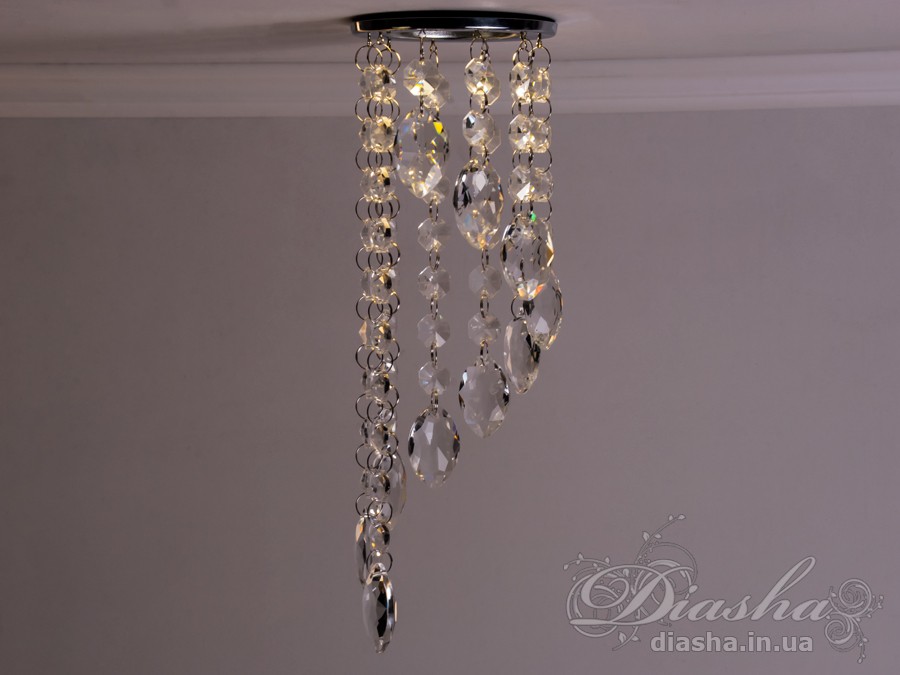 Бездоганна елегантність цього точкового світильника, поєднана з сяючим блиском високоякісного кришталю принесе Вам чимало приємних хвилин. 
Наприклад, Ви зможете доповнити інтер'єр з люстрою серії 