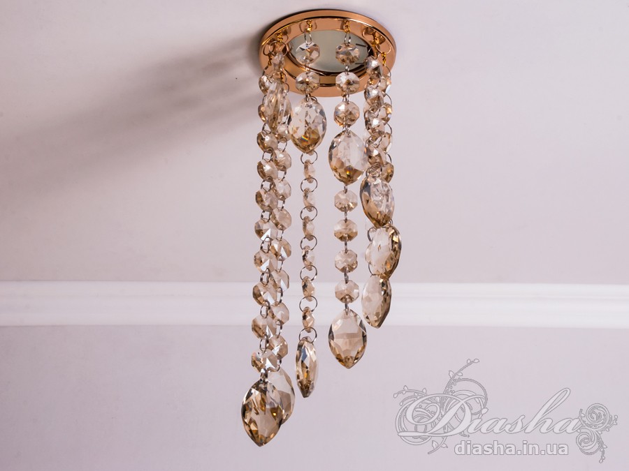 Бездоганна елегантність цього точкового світильника, поєднана з сяючим блиском високоякісного кришталю принесе Вам чимало приємних хвилин. 
Наприклад, Ви зможете доповнити інтер'єр з люстрою серії 