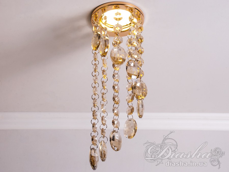 Бездоганна елегантність цього точкового світильника, поєднана з сяючим блиском високоякісного кришталю принесе Вам чимало приємних хвилин. 
Наприклад, Ви зможете доповнити інтер'єр з люстрою серії 