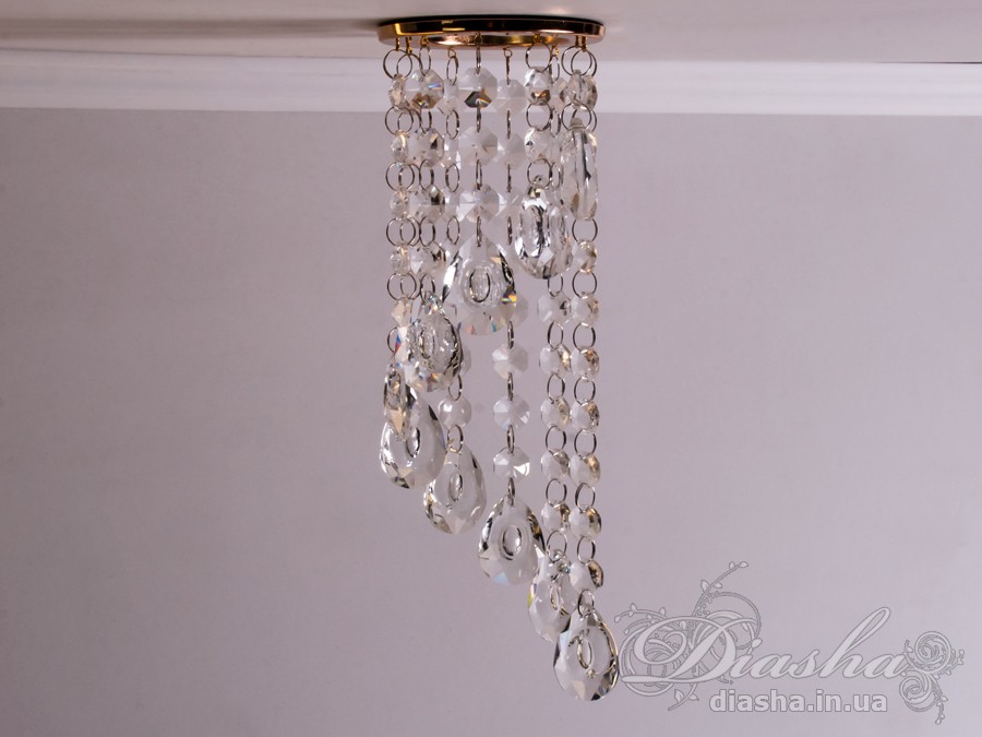 Бездоганна елегантність цього точкового світильника, поєднана з сяючим блиском високоякісного кришталю принесе Вам чимало приємних хвилин. 
Наприклад, Ви зможете доповнити інтер'єр з люстрою серії 