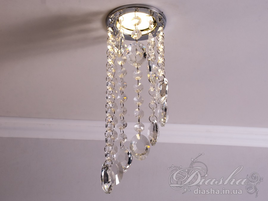 Бездоганна елегантність цього точкового світильника, поєднана з сяючим блиском високоякісного кришталю принесе Вам чимало приємних хвилин. 
Наприклад, Ви зможете доповнити інтер'єр з люстрою серії 