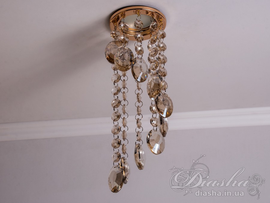 Бездоганна елегантність цього точкового світильника, поєднана з сяючим блиском високоякісного кришталю принесе Вам чимало приємних хвилин. 
Наприклад, Ви зможете доповнити інтер'єр з люстрою серії 