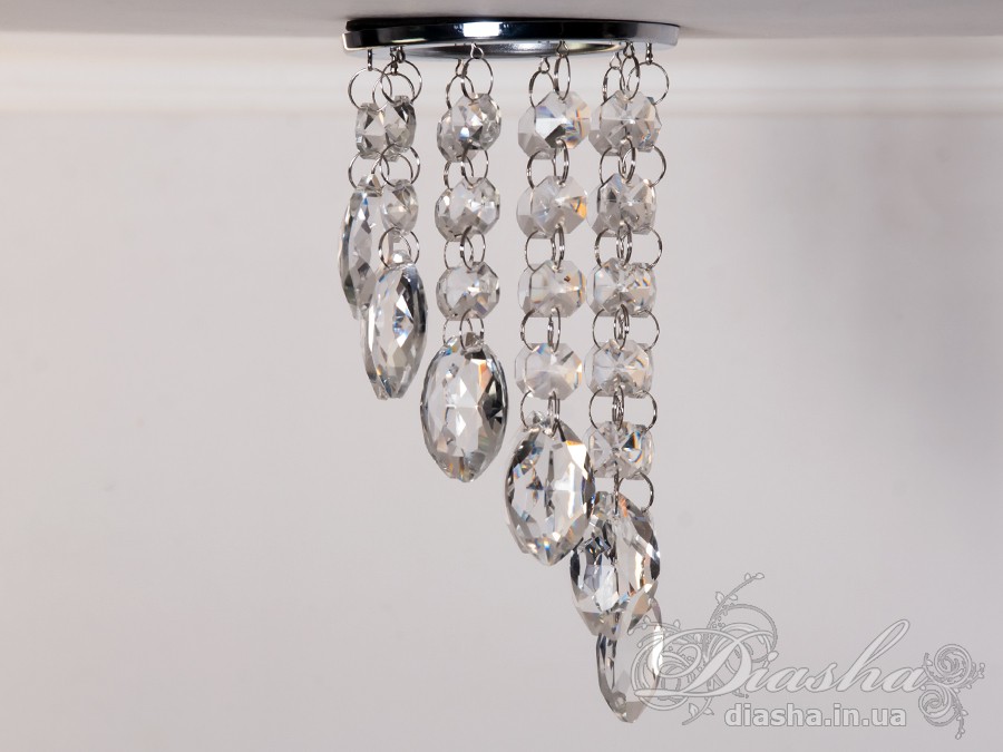 Бездоганна елегантність цього точкового світильника, поєднана з сяючим блиском високоякісного кришталю принесе Вам чимало приємних хвилин. 
Наприклад, Ви зможете доповнити інтер'єр з люстрою серії 