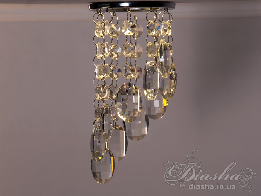 Бездоганна елегантність цього точкового світильника, поєднана з сяючим блиском високоякісного кришталю принесе Вам чимало приємних хвилин. 
Наприклад, Ви зможете доповнити інтер'єр з люстрою серії 