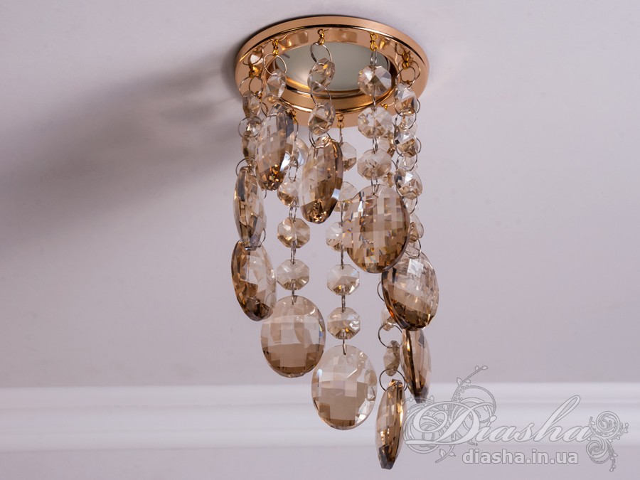 Бездоганна елегантність цього точкового світильника, поєднана з сяючим блиском високоякісного кришталю принесе Вам чимало приємних хвилин. 
Наприклад, Ви зможете доповнити інтер'єр з люстрою серії 