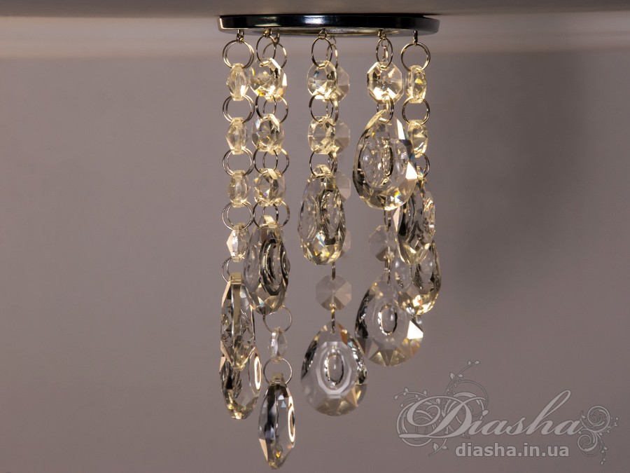 Бездоганна елегантність цього точкового світильника, поєднана з сяючим блиском високоякісного кришталю принесе Вам чимало приємних хвилин. 
Наприклад, Ви зможете доповнити інтер'єр з люстрою серії 