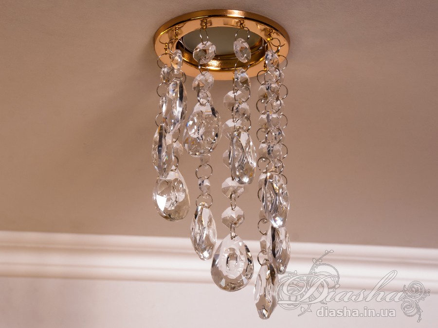 Бездоганна елегантність цього точкового світильника, поєднана з сяючим блиском високоякісного кришталю принесе Вам чимало приємних хвилин. 
Наприклад, Ви зможете доповнити інтер'єр з люстрою серії 