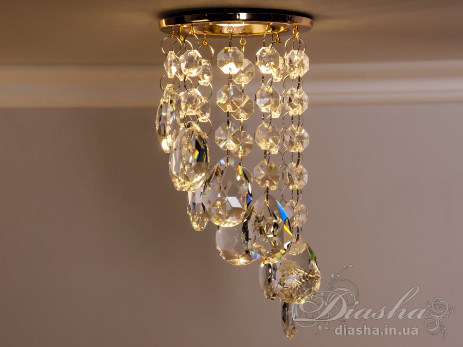 Бездоганна елегантність цього точкового світильника, поєднана з сяючим блиском високоякісного кришталю принесе Вам чимало приємних хвилин. 
Наприклад, Ви зможете доповнити інтер'єр з люстрою серії 