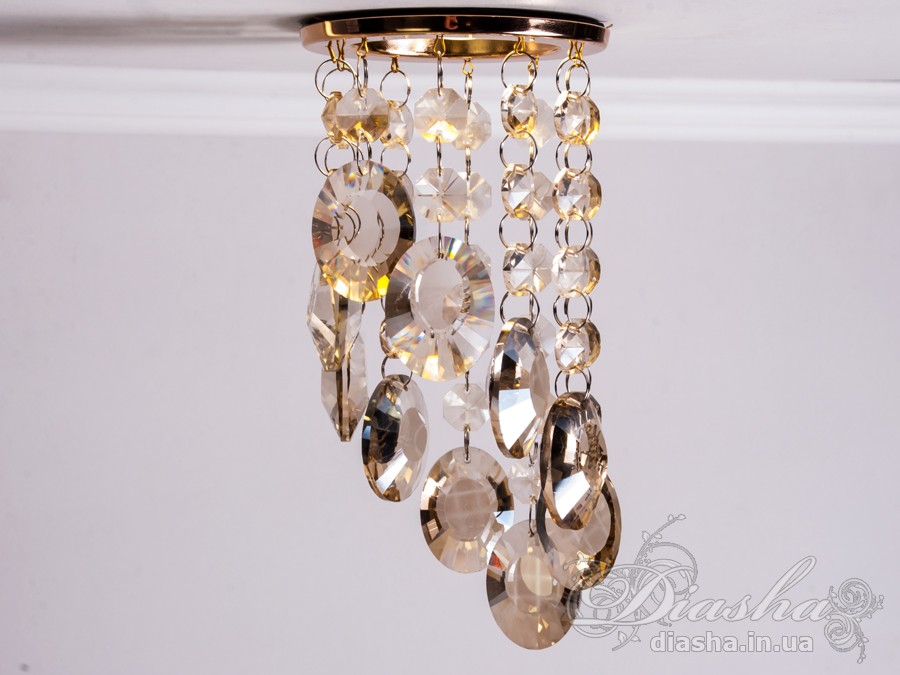 Бездоганна елегантність цього точкового світильника, поєднана з сяючим блиском високоякісного кришталю принесе Вам чимало приємних хвилин. 
Наприклад, Ви зможете доповнити інтер'єр з люстрою серії 