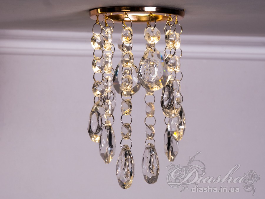 Бездоганна елегантність цього точкового світильника, поєднана з сяючим блиском високоякісного кришталю принесе Вам чимало приємних хвилин. 
Наприклад, Ви зможете доповнити інтер'єр з люстрою серії 