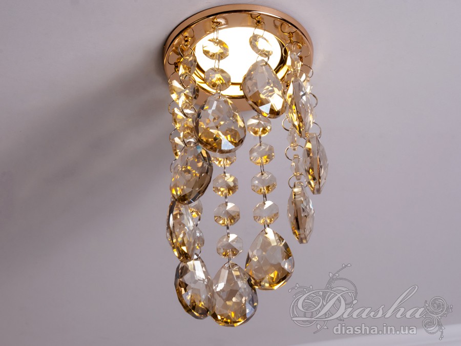 Бездоганна елегантність цього точкового світильника, поєднана з сяючим блиском високоякісного кришталю принесе Вам чимало приємних хвилин. 
Наприклад, Ви зможете доповнити інтер'єр з люстрою серії 