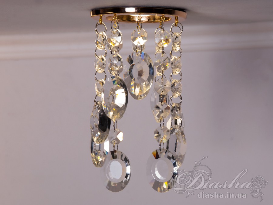 Бездоганна елегантність цього точкового світильника, поєднана з сяючим блиском високоякісного кришталю принесе Вам чимало приємних хвилин. 
Наприклад, Ви зможете доповнити інтер'єр з люстрою серії 