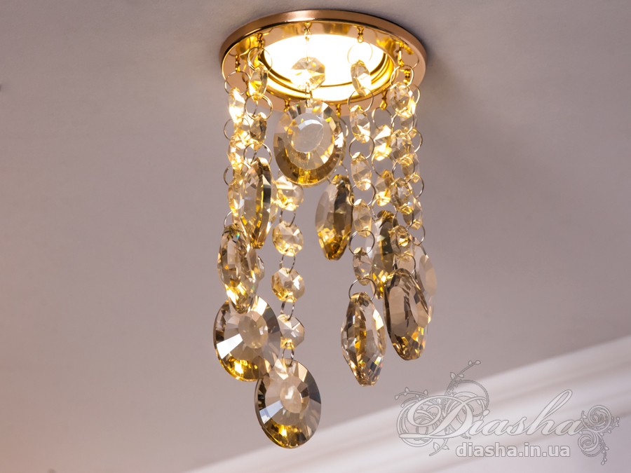 Бездоганна елегантність цього точкового світильника, поєднана з сяючим блиском високоякісного кришталю принесе Вам чимало приємних хвилин. 
Наприклад, Ви зможете доповнити інтер'єр з люстрою серії 