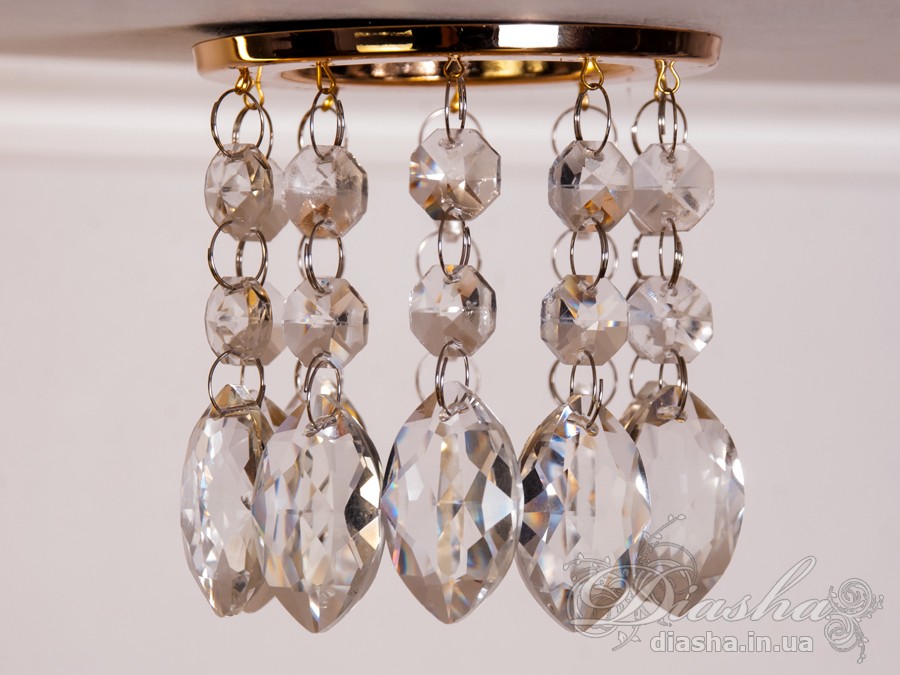 Бездоганна елегантність цього точкового світильника, поєднана з сяючим блиском високоякісного кришталю принесе Вам чимало приємних хвилин. 
Наприклад, Ви зможете доповнити інтер'єр з люстрою серії 