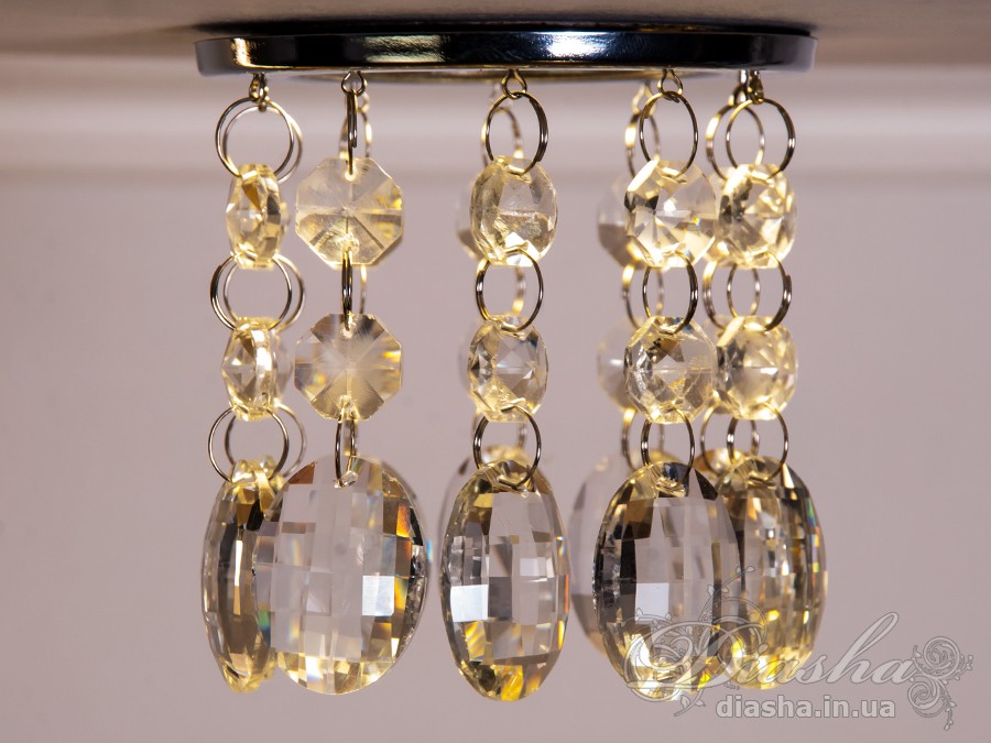 Бездоганна елегантність цього точкового світильника, поєднана з сяючим блиском високоякісного кришталю принесе Вам чимало приємних хвилин. 
Наприклад, Ви зможете доповнити інтер'єр з люстрою серії 