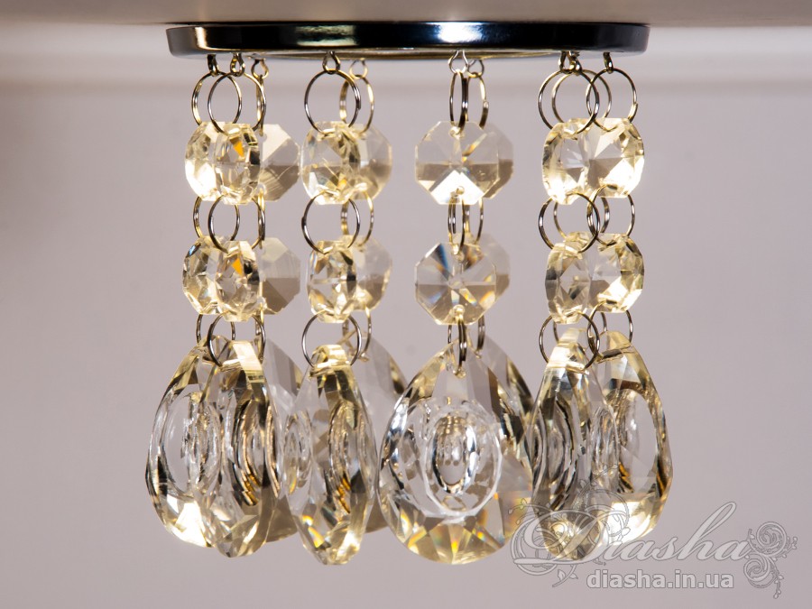 Бездоганна елегантність цього точкового світильника, поєднана з сяючим блиском високоякісного кришталю принесе Вам чимало приємних хвилин. 
Наприклад, Ви зможете доповнити інтер'єр з люстрою серії 