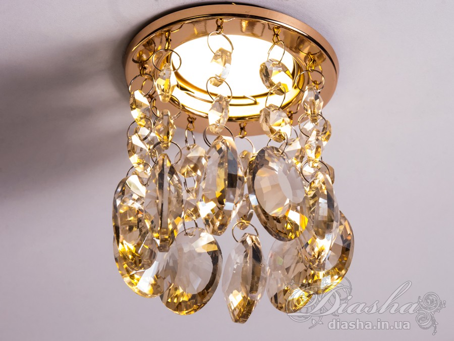 Бездоганна елегантність цього точкового світильника, поєднана з сяючим блиском високоякісного кришталю принесе Вам чимало приємних хвилин. 
Наприклад, Ви зможете доповнити інтер'єр з люстрою серії 