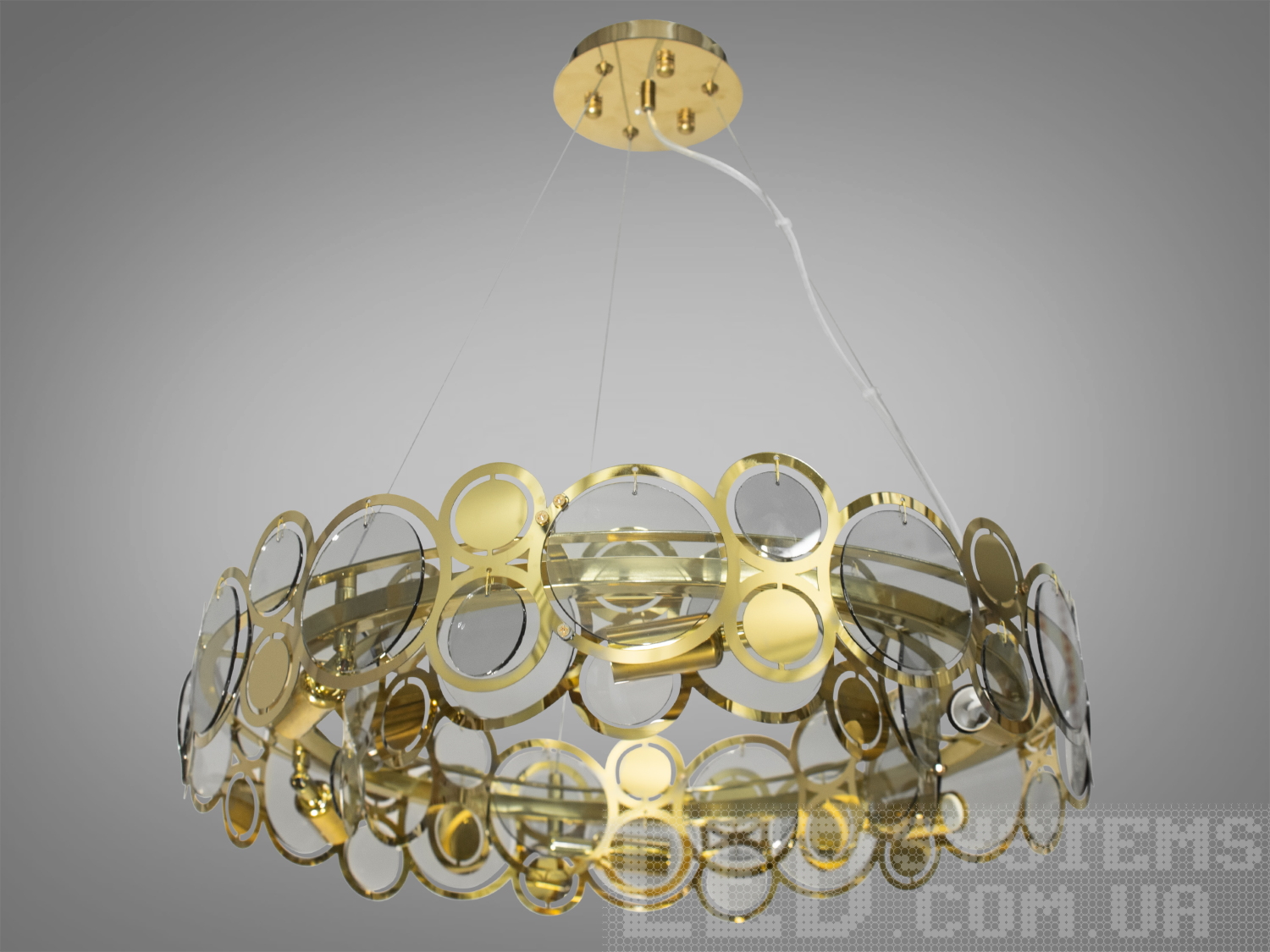 Сучасна підвісна люстра кругами виготовлена зі скляних пелюсток замість металевих. На неї можна дивитися під будь-яким кутом, і не дивлячись на легкість конструкції люстри, ви завжди бачитимете лампи тільки через тоноване скло. У той же час весь світ випромінюваний лампами перевідбившись від поверхні скляних пелюсток поступово пошириться по приміщенню.
Сучасна люстра під звичайну лампочку із цоколем Е14.
Увага. Вага люстри понад 10кг.