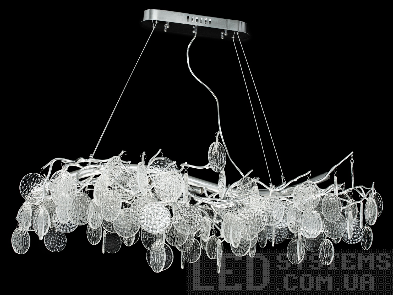 Сучасна люстра-підвіс зі скляними колами в сучасному класичному стилі на 12 ламп підходить також для довгастих кімнат. Пропорції овальних люстр ідеально гармонують із великими обідніми столами.&nbsp;Люстра спеціально розрахована так, що максимум яскравого світла потрапить на стіл, а решта місця приміщення наповниться м'яким світлом розсіяним скляними колами-підвісками.&nbsp;Стельове кріплення на планку універсальне та підходить для навісних, натяжних та звичайних стель. Застосовується як для приміщень з високими стелями, так і з невисокими, оскільки регулюється висота.&nbsp;Люстра-підвіс під світлодіодні або галогенові лампочки з цоколем g9.&nbsp;
Увага. Вага люстри понад 10кг.