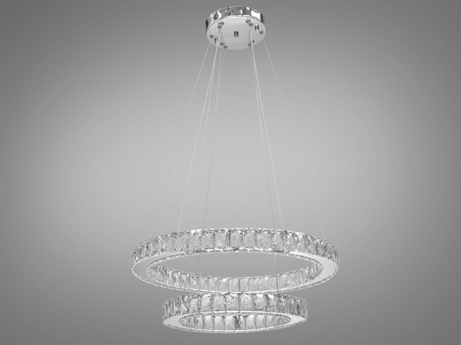 Підвісна каскадна кришталева світлодіодна люстра для залу також ідеально підходить для використання в холах або вітальні, сходових зонах приватних будинків, ресторанів або готелях, люксових спальнях, балконах або у вестибюлі, бізнес-центри або офісні простори.
Загальна концепція люстри робить її універсальною та здатною доповнювати різноманітні стилі інтер'єру, таких як: класичний стиль, сучасний мінімалізм, еклектика, ретро чи вінтаж, люксовий модерн, бароко чи рококо.
Загальна потужність люстри - 60 Вт, що забезпечує достатнє освітлення для приміщення різних розмірів. Висота люстри &ndash; 100 см, що дозволяє їй стати центральним акцентом кімнати, створюючи враження величі та розкоші.
Каскадні люстри ідеально підійдуть для використання у приміщеннях з висотою від двох з половиною до п'яти, і навіть до семи метрів.
Починаючи з верхнього кришталевого кільця, що граційно спускається вниз, кожне наступне кільце вражає своєю елегантністю та пропорційністю. Рівновіддалені кільця, які послідовно зменшуються, створюють враження легкості та гармонії.
Основа кришталевого кільця виготовлена з високоякісного металу, який не тільки забезпечує стійкість та надійність, але й служить чудовою основою для блиску кристалів.
Функціональною особливістю цієї люстри є наявність пульта дистанційного керування, що дозволяє регулювати колірну температуру світла, створюючи різні атмосфери у приміщенні залежно від ваших потреб та настрою.
Кріпиться до стелі будь-якого типу універсальним кріпленням на монтажну планку.
