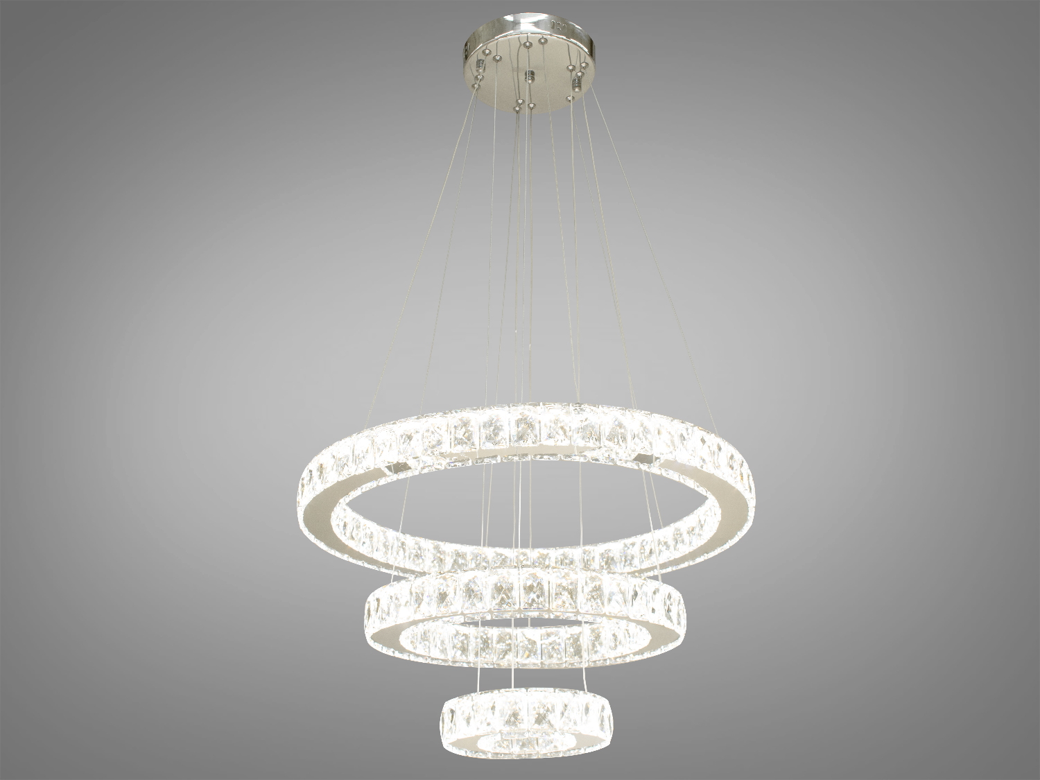 Підвісна каскадна кришталева світлодіодна люстра для залу також ідеально підходить для використання в холах або вітальні, сходових зонах приватних будинків, ресторанів або готелях, люксових спальнях, балконах або у вестибюлі, бізнес-центри або офісні простори.
Загальна концепція люстри робить її універсальною та здатною доповнювати різноманітні стилі інтер'єру, таких як: класичний стиль, сучасний мінімалізм, еклектика, ретро чи вінтаж, люксовий модерн, бароко чи рококо.
Загальна потужність люстри - 70 Вт, що забезпечує достатнє освітлення для приміщення різних розмірів. Висота люстри &ndash; 100 см, що дозволяє їй стати центральним акцентом кімнати, створюючи враження величі та розкоші.
Каскадні люстри ідеально підійдуть для використання у приміщеннях з висотою від двох з половиною до п'яти, і навіть до семи метрів.
Починаючи з верхнього кришталевого кільця, що граційно спускається вниз, кожне наступне кільце вражає своєю елегантністю та пропорційністю. Рівновіддалені кільця, які послідовно зменшуються, створюють враження легкості та гармонії.
Основа кришталевого кільця виготовлена з високоякісного металу, який не тільки забезпечує стійкість та надійність, але й служить чудовою основою для блиску кристалів.
Функціональною особливістю цієї люстри є наявність пульта дистанційного керування, що дозволяє регулювати колірну температуру світла, створюючи різні атмосфери у приміщенні залежно від ваших потреб та настрою.
Кріпиться до стелі будь-якого типу універсальним кріпленням на монтажну планку.
