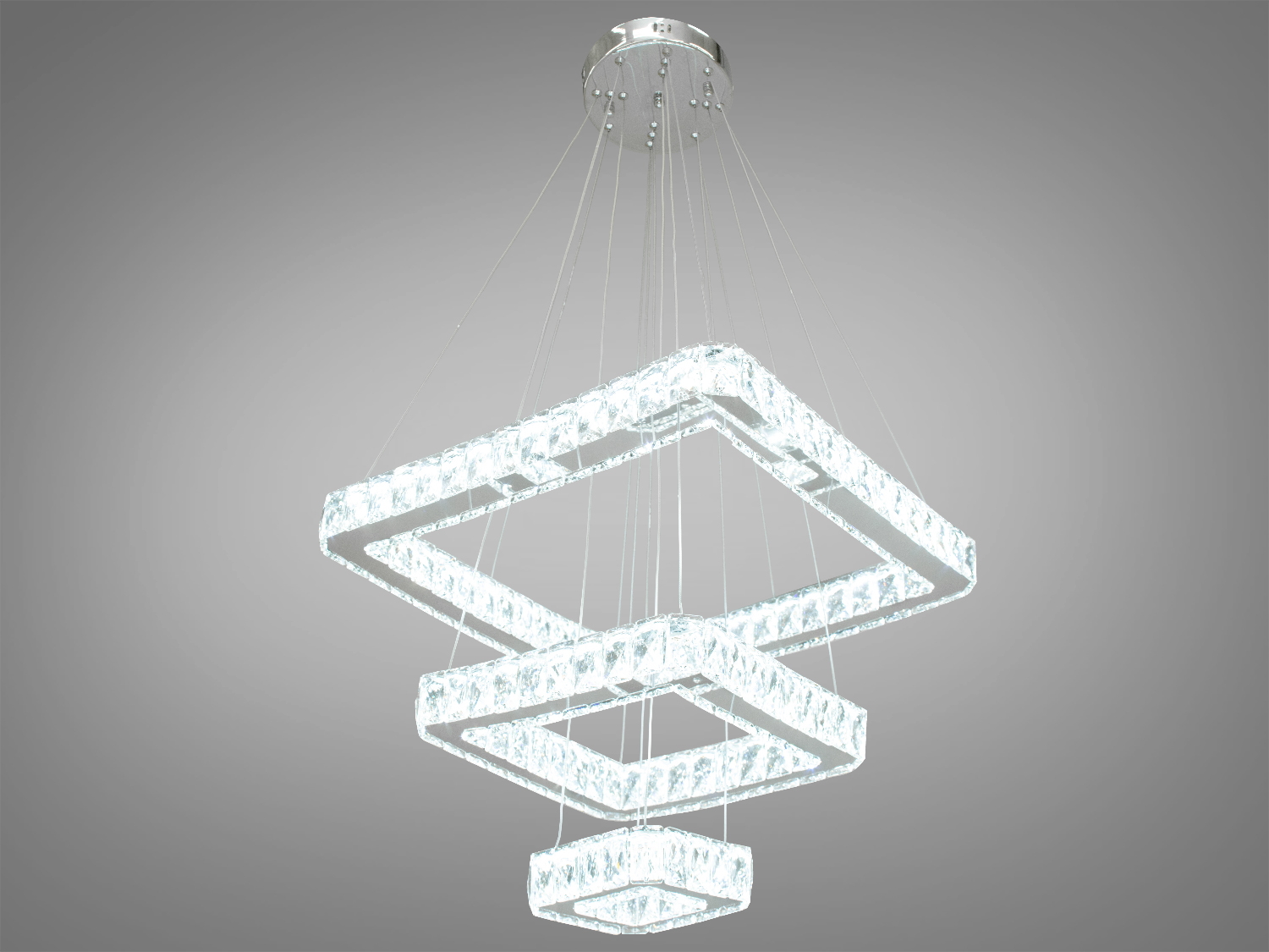 Елегантна підвісна кришталева LED люстра для залу також ідеально підходить для використання в холах або вітальнях, сходових зонах приватних будинків, ресторанах чи готелях, люксових спальнях, балконах або у вестибюлі, бізнес-центри або офісні простори.
Загальна концепція люстри робить її універсальною та здатною доповнювати різні стилі інтер'єру, такі як: класичний стиль, сучасний мінімалізм, еклектика, ретро чи вінтаж, люксовий модерн, бароко чи рококо.
Загальна потужність люстри - 80 Вт, що забезпечує достатнє освітлення для приміщення різних розмірів. Висота люстри &ndash; 100 см, що дозволяє їй стати центральним акцентом кімнати, створюючи враження величі та розкоші.
Функціональною особливістю цієї люстри є наявність пульта дистанційного керування. Завдяки регулюванню колірної температури 3200К, 4100К, 6000К, ви зможете вибрати той режим освітлення, який найбільше відповідає вашим потребам: тепле світло для розслаблення, нейтральне для роботи або холодне для концентрації. Режим увімкнення забезпечує швидкий доступ до різних режимів освітлення.
Починаючи з верхнього кришталевого кільця, що граційно спускається вниз, кожне кільце вражає своєю елегантністю та пропорційністю. Рівновіддалені кільця, що послідовно зменшуються, створюють враження легкості та гармонії.
Основа кришталевого кільця виготовлена з високоякісного металу, який не тільки забезпечує стійкість та надійність, але й служить чудовою основою для блиску кристалів.
Кріпляться до стель будь-якого типу універсальним кріпленням на монтажну планку.