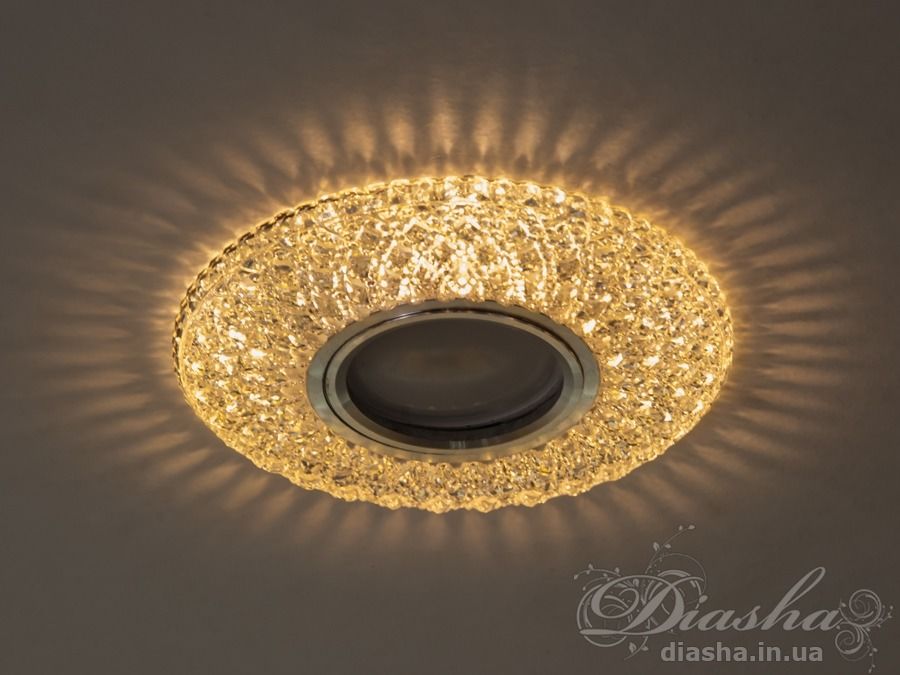 Точковий світильник Diasha 7760WH з кришталевими оздобленнями та білим LED підсвічуванням створює унікальну атмосферу у вашому інтер′єрі.