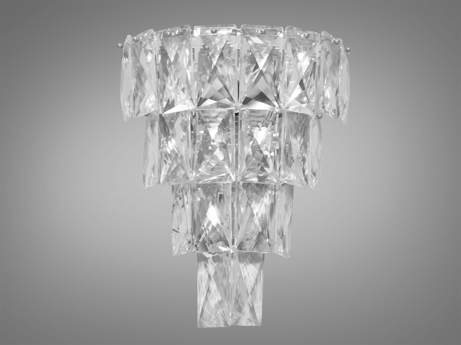 Сучасне настінне бра з кришталю виконане в класичному стилі та розраховане на 3 лампи: звичайні розжарювання, економки, або світлодіодні лампи з цоколем Е14. Застосовується в спальню, вітальню, коридор та для залу.
Розкішний класичний світильник буде незмінно актуальним як у класичному інтер'єрі, так і в квартирі студії у стилі лофт подарує крапельку суворості та впорядкованості.
Кріпиться до стіни будь-якого типу універсальним кріпленням на монтажну планку.