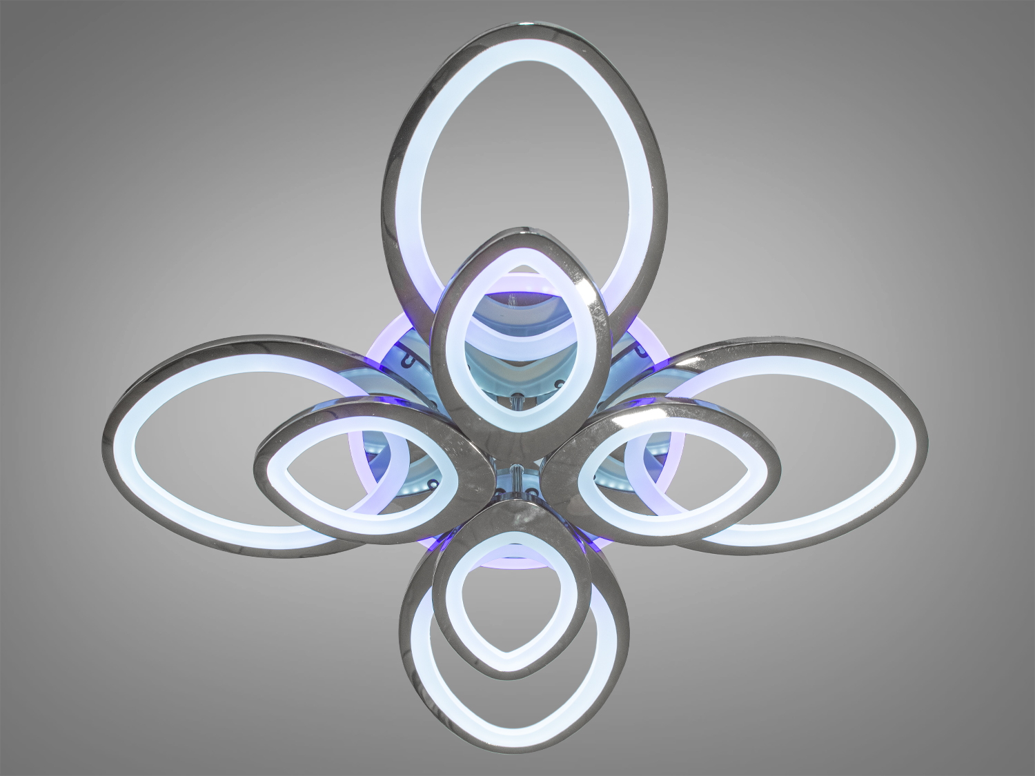 Яскрава світлодіодна люстра з LED підсвічуванням, з диммером, з пультом підходить на площу приміщення приблизно 22кв.м.
Світлодіодна люстра має кілька режимів: холодний 6000К, нейтральний 4100К, теплий 3200К, кольорове підсвічування, суміщений режим &ndash; будь-яке основне світло плюс будь-який колір світлодіодного підсвічування. Регулювання яскравості люстри від 5 до 100% відбувається за допомогою пульта дистанційного керування, що входить до комплекту.
Кожне кільце випромінює світло, що розливається навколо і створює атмосферу затишку та релаксації. Люстра є справжнім артефактом у світі освітлювальних приладів, що поєднує у собі неповторність форми та функціональність. Вона вносить в інтер'єр особливу магію світла, перетворюючи будь-яке приміщення на місце, де кожен куточок наповнений історією та характером.
Переваги акрилових розсіювачів знаходять своє відображення у міцності, довговічності та легкості конструкції люстри. Вона відрізняється низьким енергоспоживанням, що робить її економічно вигідною, а також малою висотою від стелі, ідеальною для просторів з обмеженою висотою стелі.
Люстра світить яскраво, але не сліпить за рахунок матеріалу &ndash; акрилу, до того ж цей матеріал дуже міцний &ndash; його важко зашкодити. Застосовується для зали, вітальні, кухні, спальні, їдальні, дитячої, тому що відсутні елементи, що б'ються.
Універсальне кріплення на монтажну планку підходить для стель будь-якого типу.