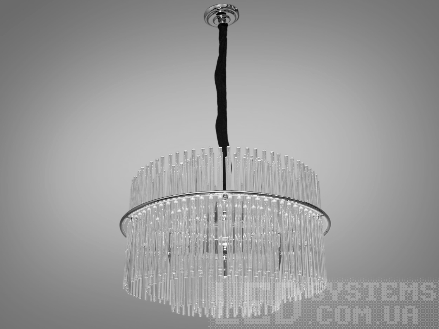 Сучасна підвісна люстра зі скляними підвісками у вигляді паличок &ndash; це втілення ефемерності та витонченості. Ця люстра стане чудовим акцентом у вітальнях, їдальнях чи сучасних холах.
Дизайн люстри створює відчуття парячих у повітрі скляних паличок. Непомітний каркас підтримує їх, зберігаючи їхню легкість і дозволяючи світлу проникати через прозорі скляні елементи, заповнюючи простір м'яким та приємним світлом.
Люстра-підвіс під звичайні лампочки розжарювання, економки або світлодіодні лампи із цоколем Е14. Стельове кріплення на універсальну монтажну планку підходить для підвісних, натяжних та звичайних стель.
Увага. Вага люстри понад 10кг.


