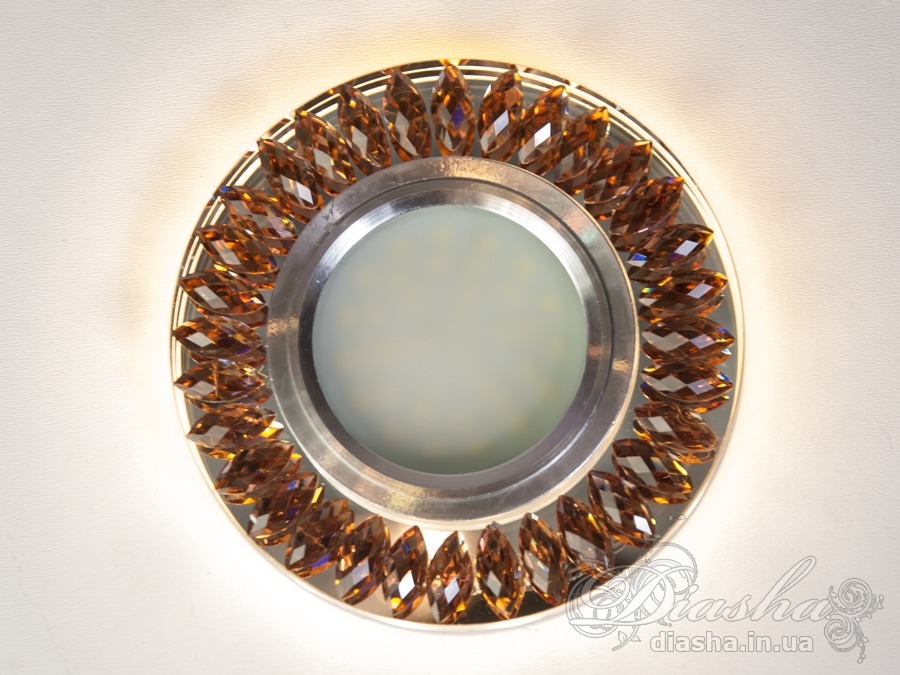 &nbsp;&nbsp;&nbsp;Точкові світильники прості та легкі в установці, тому їх монтування не займе багато часу та праці. Вони запросто можуть змінити простір приміщення. Якщо точкові світильники встановити по периметру стелі, то він буде здаватися вище, а сама кімната - набагато більше. Прийміть це як керівництво до дії. І тоді ці кришталеві точкові світильники будуть здатні забезпечити Вам комфорт саме на тому рівні, якого Ви так довго чекали. Для оптових покупців відпускається лише ящиками по 50 шт.
Конструкція світильника ідеально розрахована на використання з натяжними стелями.
&nbsp;&nbsp;&nbsp;Лампа і трансформатор в комплект не входять.