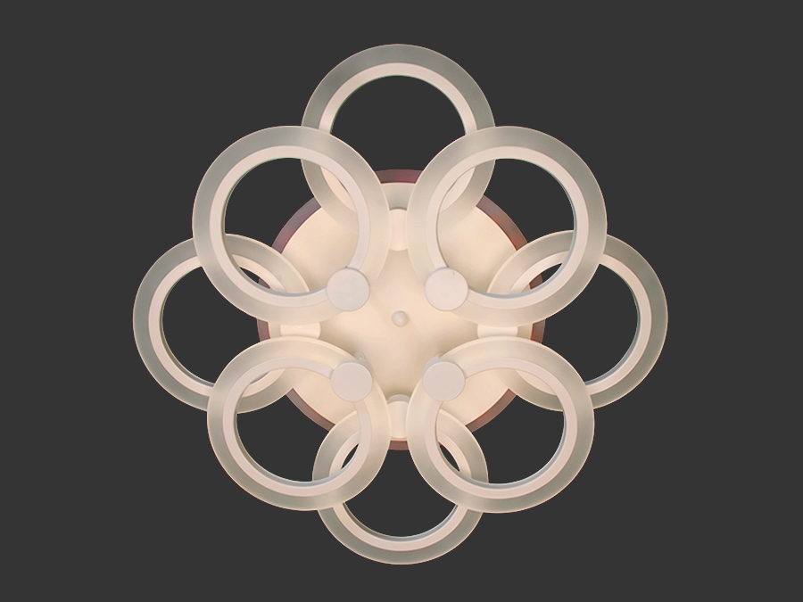 Стельова LED люстра в спальню з LED підсвічуванням, з пультом, з димером підходить на площу приміщення приблизно 16 кв.м. Застосовується для зали, вітальні, спальні, кухні, коридору, дитячої, оскільки відсутні скляні елементи.
Світлодіодна люстра має кілька режимів: холодний 6000К, нейтральний 4100К, теплий 3200К, включення-вимикання, кольорове підсвічування, змішаний режим. Люстра має електронний димер, що дозволяє регулювати яскравість люстри від 5% до 100% за допомогою пульта, що входить до комплекту.
Кріпиться до стелі будь-якого типу універсальним кріпленням на монтажну планку.