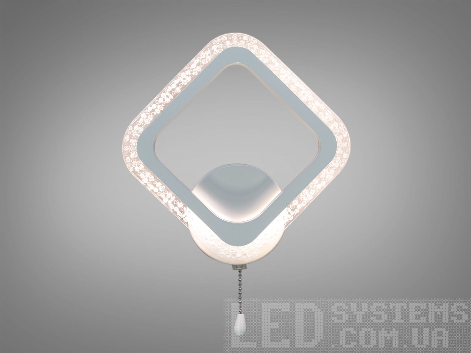 Ніжне світлодіодне бра у спальню білого кольору, потужністю 14W, із плафоном квадратної форми. Призначений для читання та освітлення. За допомогою вимикача є можливість зміни температури світла: холодний 6400К, нейтральний 4500К, теплий 2700К, а також увімкнення-вимкнення як з настінного вимикача, так і шнурком на самому бра. Настінний світильник не сліпить за рахунок матеріалу - акрилу, до того ж цей матеріал дуже міцний - його важко пошкодити. Кріпиться до стіни, до гіпсокартону або до інших настінних поверхонь.