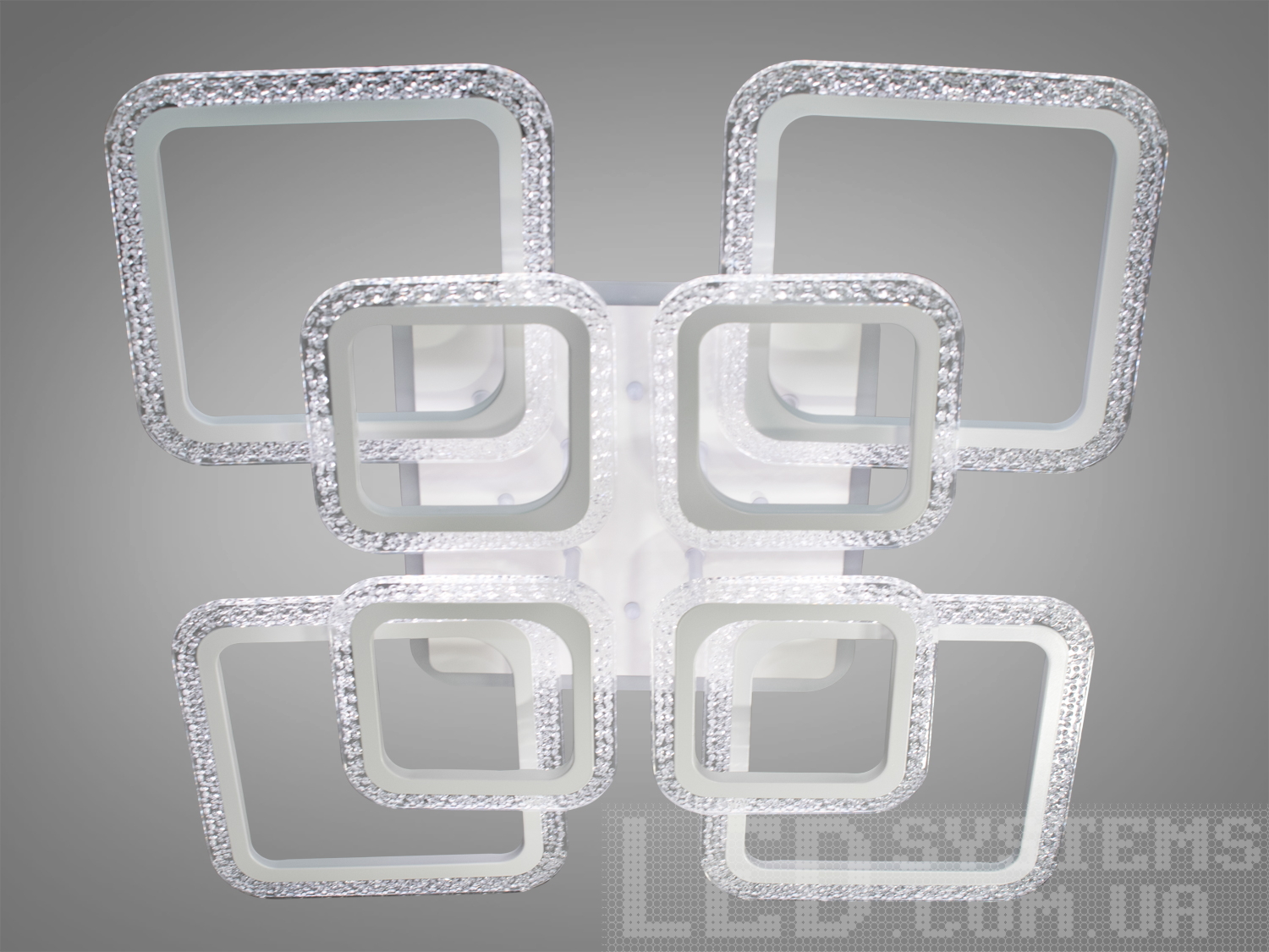 Акрилова люстра світлодіодна в спальню з димером, з LED підсвічуванням, з пультом підходить на площу приміщення приблизно 25кв.м.
Світлодіодна люстра має кілька режимів: холодний 6400К, нейтральний 4500К, теплий 2700К, кольорове підсвічування, суміщений режим &ndash; будь-яке основне світло плюс будь-який колір світлодіодного підсвічування. Регулювання яскравості люстри від 5 до 100% відбувається за допомогою пульта дистанційного керування, що входить до комплекту.
Люстра світить яскраво, але не сліпить за рахунок матеріалу &ndash; акрилу, до того ж цей матеріал дуже міцний &ndash; його важко зашкодити. Застосовується для невеликого залу, вітальні, кухні, спальні, їдальні, дитячої, тому що відсутні елементи, що б'ються. Кріпиться до підвісних, натяжних, звичайних стель.