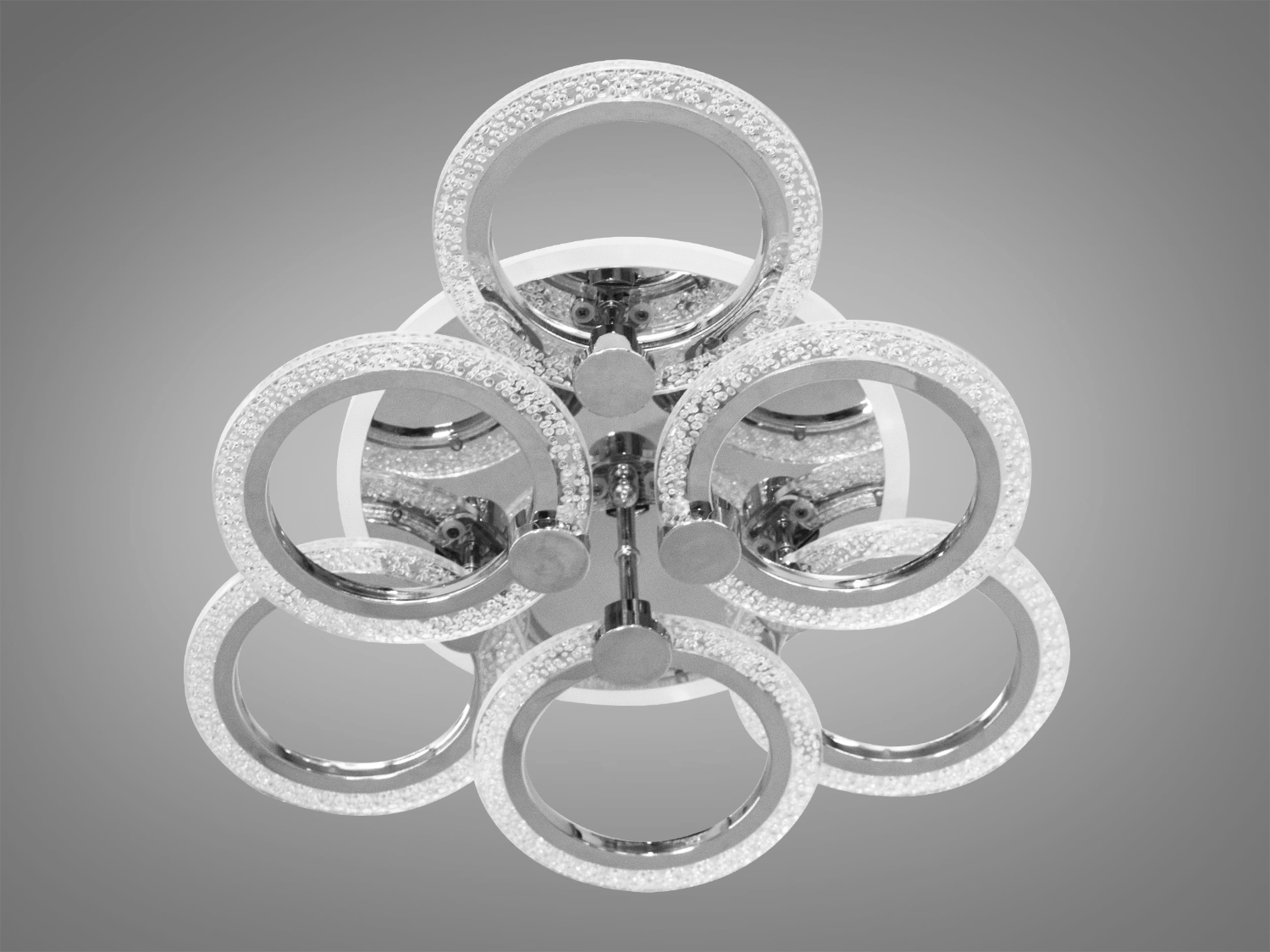 Стильна світлодіодна люстра в стилі хай-тек з пультом, з LED підсвічуванням, з димером підходить на площу приміщення приблизно 11 кв.м. Застосовується для зали, вітальні, спальні, кухні, коридору, дитячої, оскільки відсутні скляні елементи.
Світлодіодна люстра має кілька режимів: холодний 6000К, нейтральний 4100К, теплий 3200К, включення-вимикання, кольорове підсвічування, змішаний режим. Люстра має електронний димер, що дозволяє регулювати яскравість люстри від 5% до 100% за допомогою пульта, що входить до комплекту.
Кріпиться до стелі будь-якого типу універсальним кріпленням на монтажну планку.