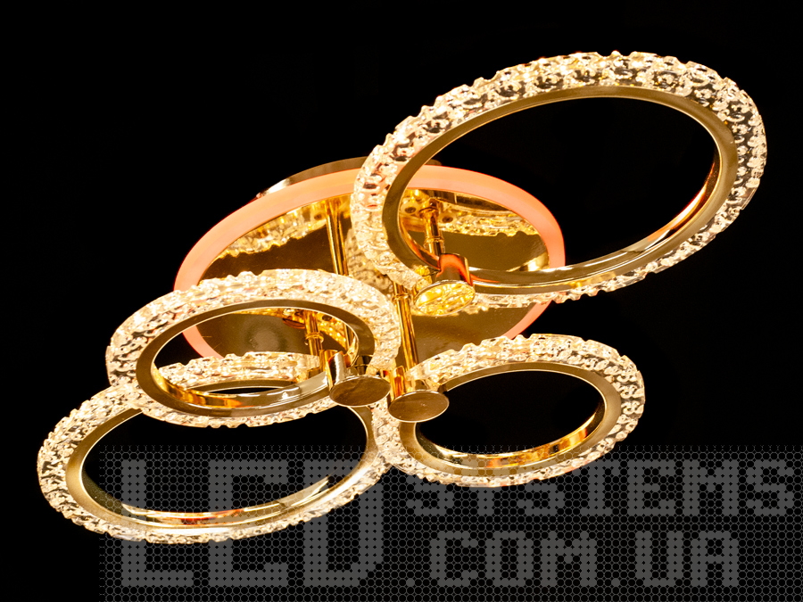 Стельова світлодіодна люстра в коридор з пультом, з LED підсвічуванням, з димером підходить на площу приміщення приблизно 11 кв.м. Застосовується для зали, вітальні, спальні, кухні, коридору, дитячої, оскільки відсутні скляні елементи.
Світлодіодна люстра має кілька режимів: холодний 6000К, нейтральний 4100К, теплий 3200К, включення-вимикання, кольорове підсвічування, змішаний режим. Люстра має електронний димер, що дозволяє регулювати яскравість люстри від 5% до 100% за допомогою пульта, що входить до комплекту.
Кріпиться до стелі будь-якого типу універсальним кріпленням на монтажну планку.