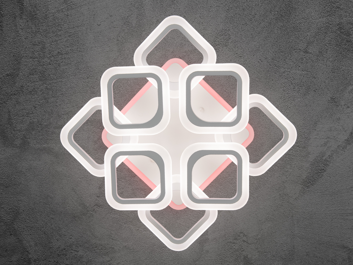 Витончена LED-люстра в спальню з пультом дистанційного керування, з димером, з LED-підсвіткою потужністю 90 Вт &mdash; це втілення мінімалізму та витонченої геометрії, що може змінити будь-який простір. Її вишуканий дизайн, що ґрунтується на перетині квадратів із м'яко заокругленими краями, створює відчуття симетрії та гармонії. Білий корпус люстри підкреслює легкість форми, а вбудована світлодіодна підсвітка додає глибини, роблячи освітлення не тільки функціональним, але й атмосферним.
Ця модель ідеально підійде для віталень, спалень, кухонь, а також для комерційних приміщень, як-от стильні кафе, офіси або зони відпочинку. Світлодіоди забезпечують рівномірне освітлення, яке можна адаптувати під настрій, змінюючи колірну температуру від теплого до холодного світла. Люстра стане ефектним акцентом в інтер`єрах, виготовлених у стилі хай-тек, мінімалізм, модерн або скандинавський.
Компактна, але потужна, вона ідеально підходить як для просторих, так і для невеликих приміщень, створюючи затишок і підкреслюючи архітектурні особливості інтер`єру. Білий колір корпусу та витончена форма роблять її універсальною для будь-яких колірних палітр, додаючи свіжості та візуальної легкості в обставу. Це не просто джерело світла, а стильний елемент декору, який підкреслить ваш смак і увагу до деталей.
Світлодіодна люстра має кілька режимів: холодний (6000К), нейтральний (4100К), і теплий (3200К), синя LED-підсвітка, червона LED-підсвітка, рожева LED-підсвітка, змішаний режим, будь-яке основне світло, будь-який колір світлодіодного. Регулювання яскравості люстри від 5 до 100% здійснюється за допомогою пульта дистанційного керування, що входить до комплекту.
Світлодіоди забезпечують високий рівень освітлення за мінімального енергоспоживання. Кріплення здійснюється на монтажну планку, забезпечуючи надійність і простоту встановлення, підходить для підвісних, натяжних і звичайних стель.