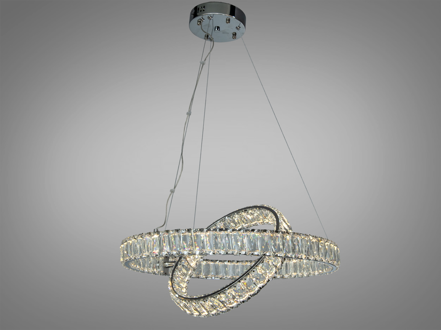 Світлодіодна люстра з двома кришталевими кільцями 88 Вт у хромі з пультом для кімнат до 15 м². Регульована яскравість та висота підвісу.