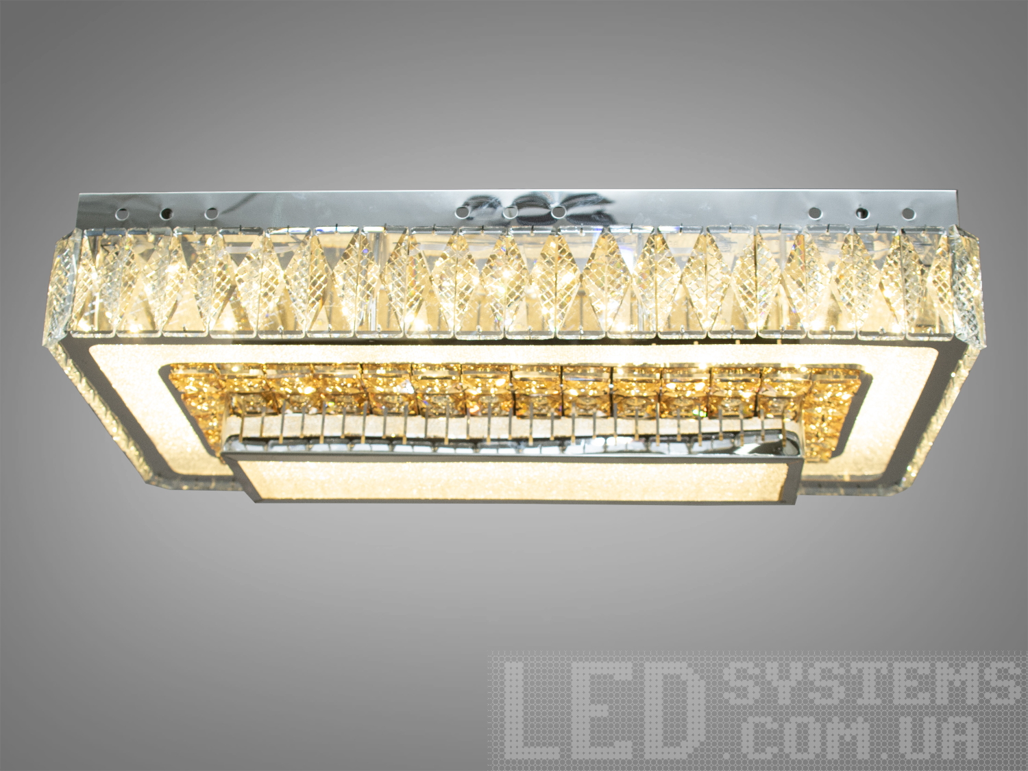 Незвичайна світлодіодна кришталева люстра в спальню призначена для створення яскравого світлодіодного освітлення з регульованою температурою кольору від теплого білого до холодного білого.
З вимикача люстра перемикається як будь-яка інша світлодіодна люстра. Кожне включення вимикання по черзі переводить люстру за такими режимами: холодне світло, тепле світло, нейтральне світло.
Світлодіодний світильник дозволяє вибирати режим освітлення від часу доби та виконуваних під його світлом завдань. Застосовується для зали, вітальні, їдальні, кухні, спальні.
Універсальне кріплення підходить для підвісних, натяжних та звичайних стель.