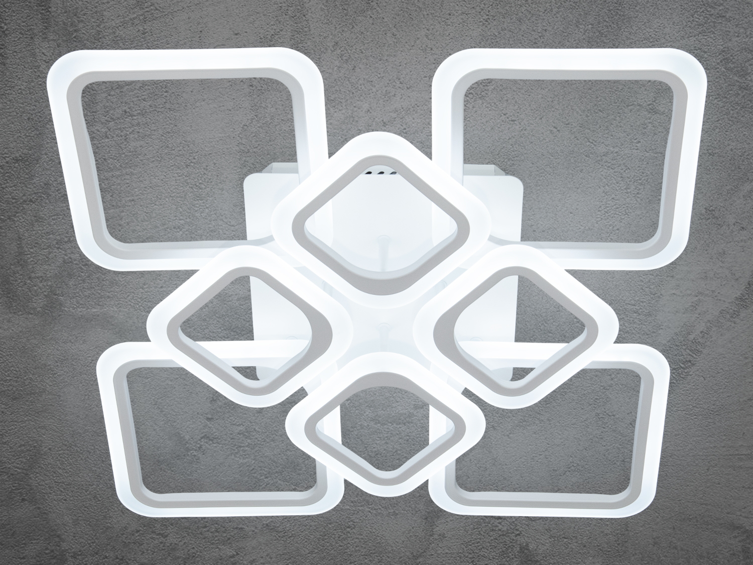 LED люстра для дитячої з пультом, з димером підходить на площу приміщення приблизно 15 кв. м. Застосовується для залу, вітальні, кухні, спальні, їдальні, дитячої, позаяк немає елементів, що б'ються. Кожен квадрат створює гармонійну композицію, додаючи сучасний і стильний акцент в інтер'єр. Люстра ідеально підходить для просторих приміщень, підкреслюючи їх геометрію та додаючи м'яке, рівномірне світло. Білі контури та білі матові вставки (розсіювач) надають люстрі витонченого й елегантного вигляду, роблячи її прекрасним вибором для будь-якого інтер'єру &mdash; класичного, сучасного та навіть у стилі &laquo;hi-tech&raquo;.
Переваги акрилових розсіювачів знаходять своє вираження в міцності, довговічності та легкості конструкції люстри. Вона вирізняється низьким енергоспоживанням, що робить її економічно вигідною, а також малою висотою від стелі, ідеальною для просторів з обмеженою висотою стелі.
Світлодіодна люстра має кілька режимів: холодний 6000К, нейтральний 4100К, теплий 3200К. Регулювання яскравості люстри від 5 до 100% відбувається за допомогою пульта дистанційного керування, який входить до комплекту. Кожне вмикання вимкнення почергово переводить люстру за такими режимами: холодне світло, тепле світло, нейтральне світло.
Світильник легко монтується на будь-які типи стель завдяки універсальному кріпленню на монтажну планку, що робить встановлення швидким, зручним і надійним.